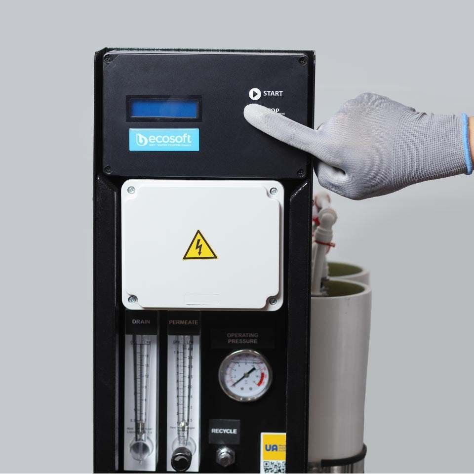 Ecosoft MO10000 4-inch reverse osmosis system with 450 LPH capacity and stainless steel frame for industrial water purification